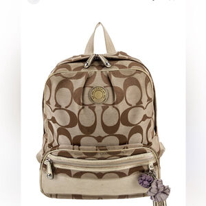 Coach Brown and Tan canvas with gold accents signature Backpack bag